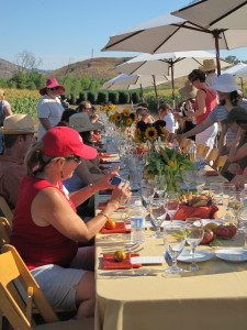 Guests enjoy Be Wise Ranch produce at a farm dinner in 2012.    ©2012 Nan Sterman