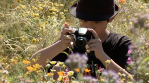 As any good scientist would do, this young man is documenting the pollinators he observes in the pollinator garden at the Natural History Museum of LA County