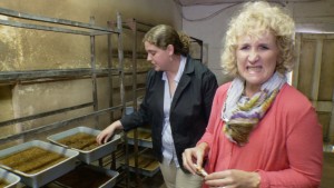 Nan reacts to seeing a tray full of fly larvae at Rincon Vitova Insectaries