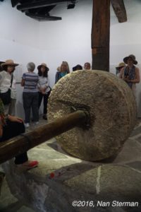 Millstones to grind olives for olive oil in Niguelas, Spain